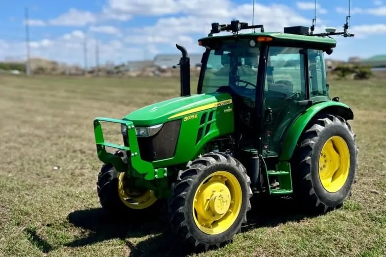 John Deere 5075E cab tractor equipped with a Sabanto Steward™ retrofit autonomy kit